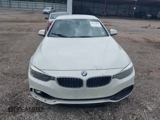 2018 BMW 4 Series 430i z VIN WBA4Z1C5XJEA31183, wystawiony jako IAAI lot #42133949 z przebiegiem 99 173 mil mil oraz . Historia ofert i sprzedaży dostępna na DreamBid. Obrazek 13.