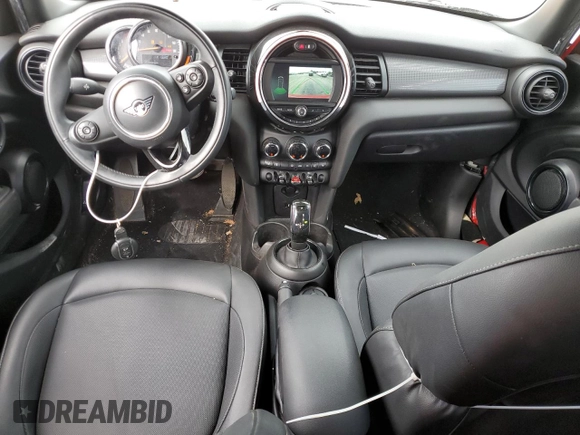 2021 MINI Hardtop 4 Door Oxford Edition z VIN WMWXU7C08M2N49721, wystawiony jako Copart lot #77983324 z przebiegiem 64 096 mil mil oraz Szkoda całkowita • Salvage title. Historia ofert i sprzedaży dostępna na DreamBid. Obrazek 8.
