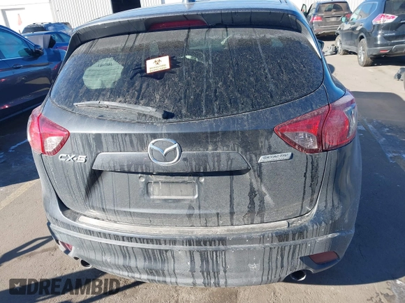 2014 Mazda CX-5 Grand Touring with VIN JM3KE2DY1E0421326, listed as a IAAI auction lot 41330794 with 127,589 mi miles. Bid and sale history available at carsss.com. Image 16.
