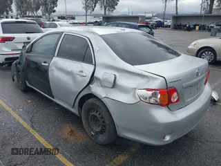 2009 Toyota Corolla with VIN 1NXBU40E39Z146748, listed as a IAAI auction lot 41523817 with 223,552 mi miles. Bid and sale history available at carsss.com. Image 3.