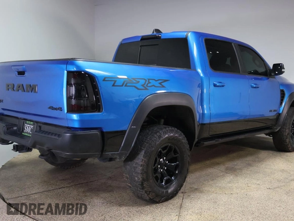 2021 Ram 1500 TRX with VIN 1C6SRFU90MN818368, listed as a Copart auction lot 77861114 with 30,633 mi miles and Salvage Title. Bid and sale history available at carsss.com. Image 3.