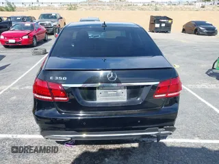 2014 Mercedes-Benz E 350 Sport with VIN WDDHF5KBXEA889555, listed as a IAAI auction lot 41589052 with 148,422 mi miles and . Bid and sale history available at DreamBid. Image 16.
