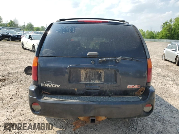 2004 GMC Envoy SLT with VIN 1GKDT13S342188670, listed as a Copart auction lot 59080825 with 334,233 mi miles and Salvage title. Bid and sale history available at DreamBid. Image 6.
