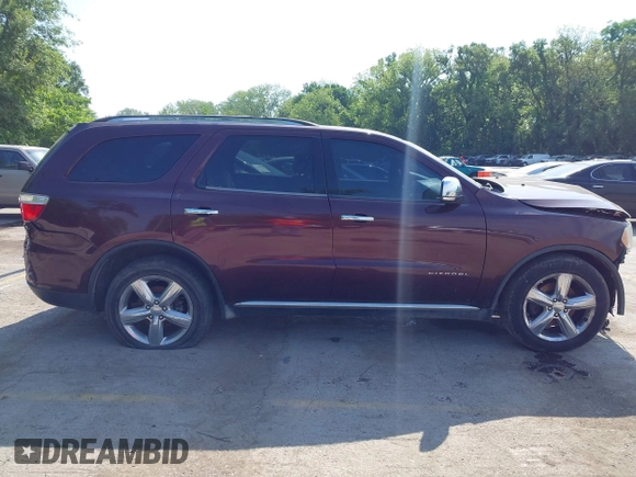 2012 Dodge Durango Citadel with VIN 1C4SDHET1CC275636, listed as a IAAI auction lot 42266742 with 212,030 mi miles and . Bid and sale history available at DreamBid. Image 13.