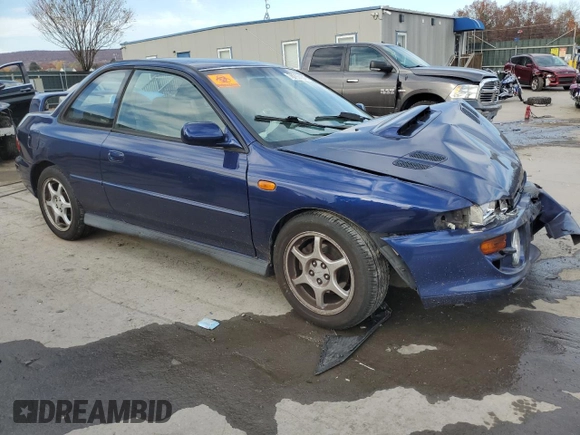 2000 Subaru Impreza RS with VIN JF1GM6750YG400589, listed as a Copart auction lot 78799154 with Not provided miles and Salvage title. Bid and sale history available at DreamBid. Image 4.