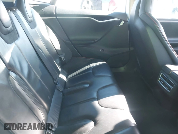 2013 Tesla Model S Performance with VIN 5YJSA1DP7DFP11737, listed as a IAAI auction lot 40915195 with Not provided miles and . Bid and sale history available at DreamBid. Image 8.