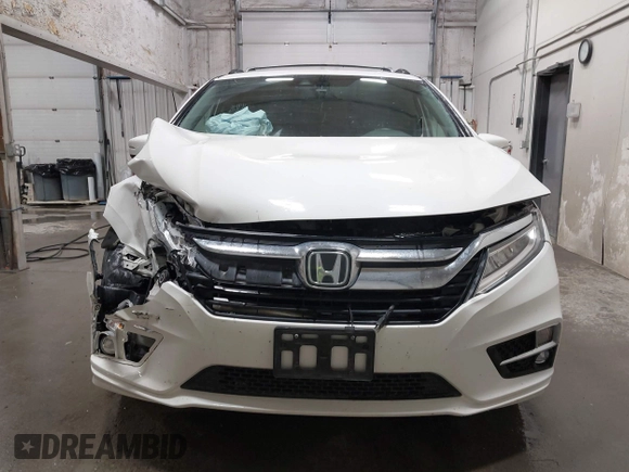 2019 Honda Odyssey Touring with VIN 5FNRL6H8XKB079113, listed as a IAAI auction lot 42359455 with 74,545 mi miles and . Bid and sale history available at DreamBid. Image 13.