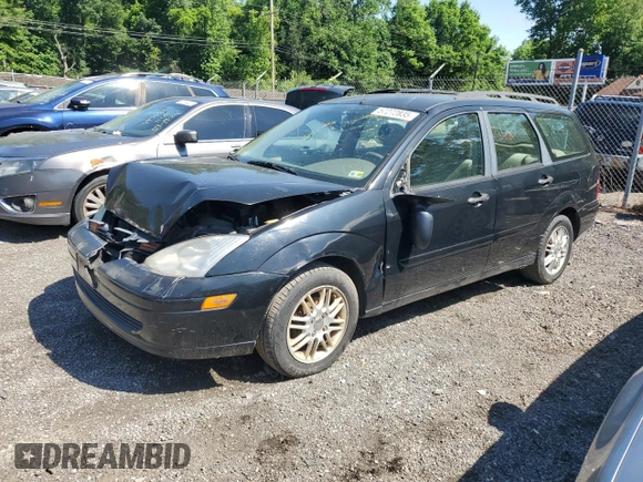 2004 Ford Focus ZTW with VIN 1FAFP35Z84W203676, listed as a Copart auction lot 57272835 with 183,115 mi miles and Salvage title. Bid and sale history available at DreamBid. Image 1.