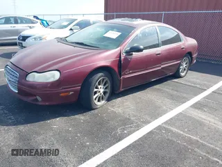 2000 Chrysler LHS with VIN 2C3HC56G1YH413455, listed as a IAAI auction lot 42038726 with 248,054 mi miles. Bid and sale history available at carsss.com. Image 2.
