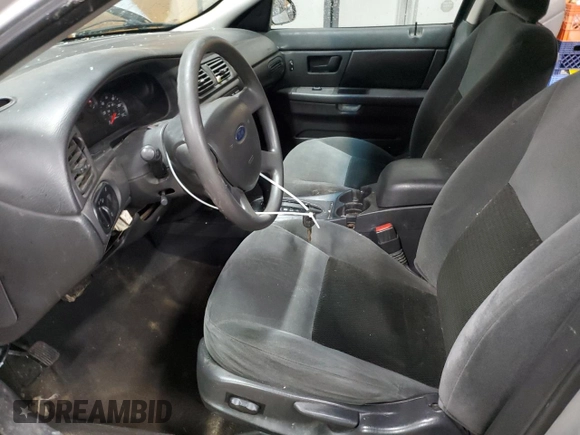 2004 Ford Taurus SE with VIN 1FAFP53224G175353, listed as a Copart auction lot 52713935 with 213,375 mi miles and Salvage Title. Bid and sale history available at DreamBid. Image 7.
