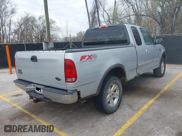 2003 Ford F-150 XL with VIN 1FTRX18L13NA95540, listed as a IAAI auction lot 41879632 with 1 mi miles. Bid and sale history available at carsss.com. Image 4.