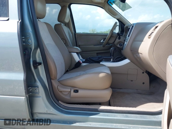 2006 Mercury Mariner Luxury с VIN 4M2CU57196KJ06015, выставлен на аукционе IAAI как лот 42579940 с пробегом 207 529 миль миль и . История ставок и продаж доступна на DreamBid. Изображение 5.