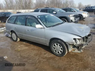 1999 Toyota Corolla с VIN AE1000286393, выставлен на аукционе Copart как лот 42634225 с пробегом 80 160 миль миль и Чистый • Clean title. История ставок и продаж доступна на DreamBid. Изображение 4.