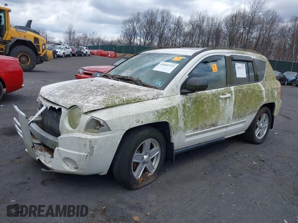 2010 Jeep Compass Sport with VIN 1J4NF4FB3AD510495, listed as a IAAI auction lot 41841332 with 148,681 mi miles. Bid and sale history available at carsss.com. Image 2.