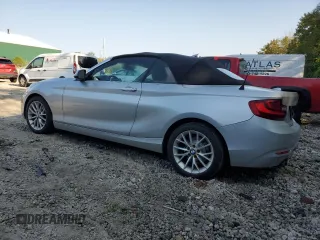 2016 BMW 2 Series 228i with VIN WBA1K9C52GV321963, listed as a Copart auction lot 71393424 with 118,029 mi miles and Salvage Title. Bid and sale history available at carsss.com. Image 2.