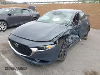 2023 Mazda 3 S Preferred with VIN 3MZBPACMXPM370840, listed as a IAAI auction lot 42035699 with Not Provided miles and . Bid and sale history available at DreamBid. Image 2.