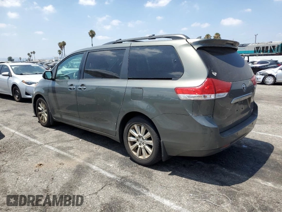 2012 Toyota Sienna XLE with VIN 5TDDK3DC1CS043460, listed as a Copart auction lot 64900495 with 190,187 mi miles and Clean title. Bid and sale history available at DreamBid. Image 2.