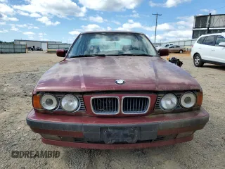 1995 BMW 5 Series 525i z VIN WBAHD632XSGK86387, wystawiony jako Copart lot #58245795 z przebiegiem 168 925 mil mil oraz Czysty tytuł • Clean title. Historia ofert i sprzedaży dostępna na DreamBid. Obrazek 5.