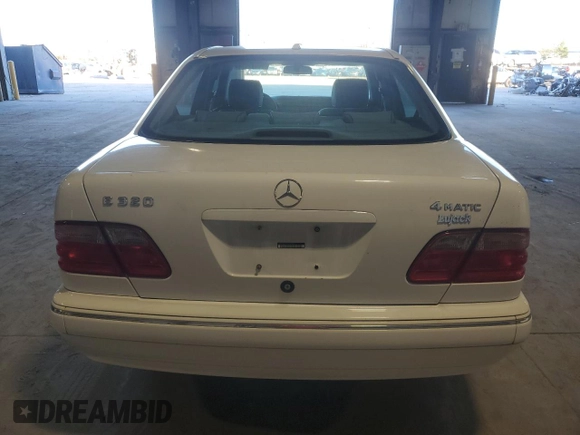 2000 Mercedes-Benz E-Class AWD with VIN WDBJF82J1YX029676, listed as a Copart auction lot 79412174 with 96,324 mi miles and Clean Title. Bid and sale history available at carsss.com. Image 6.