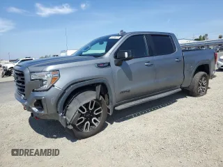2021 GMC Sierra 1500 AT4 with VIN 3GTP9EEL2MG449962, listed as a Copart auction lot 54096875 with 58,556 mi miles and Salvage title. Bid and sale history available at DreamBid. Image 1.