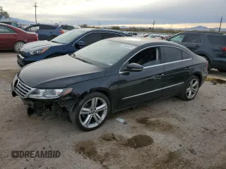 2013 Volkswagen CC Sport Plus with VIN WVWBP7AN1DE500653, listed as a Copart auction lot 82844974 with 129,287 mi miles and Salvage Title. Bid and sale history available at carsss.com. Image 1.