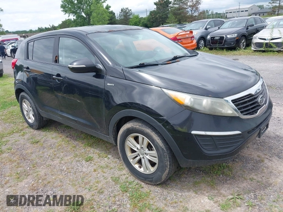 2011 Kia Sportage LX with VIN KNDPBCA27B7081079, listed as a IAAI auction lot 42692993 with 517,338 mi miles and . Bid and sale history available at DreamBid. Image 1.
