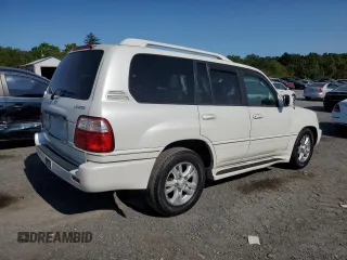 2004 Lexus LX 470 with VIN JTJHT00W243539249, listed as a Copart auction lot 70493974 with 181,155 mi miles and Clean Title. Bid and sale history available at DreamBid. Image 3.