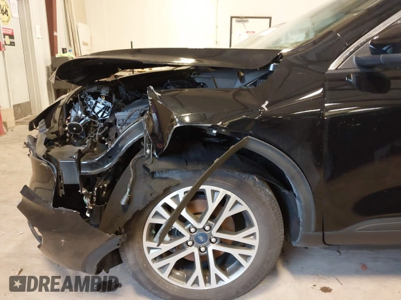 2021 Ford Escape SEL with VIN 1FMCU9H92MUA28112, listed as a IAAI auction lot 41510577 with 57,407 mi miles and . Bid and sale history available at DreamBid. Image 12.
