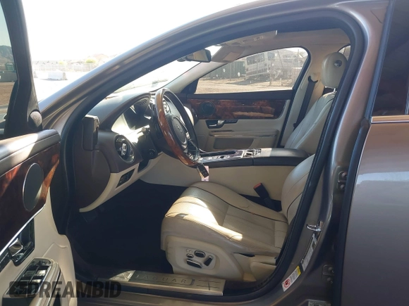 2011 Jaguar XJ XJL with VIN SAJWA2GB0BLV13469, listed as a IAAI auction lot 41836620 with 115,924 mi miles and . Bid and sale history available at DreamBid. Image 5.