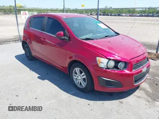 2016 Chevrolet Sonic LT with VIN 1G1JC6SH7G4127373, listed as a IAAI auction lot 41970423 with 130,440 mi miles. Bid and sale history available at carsss.com. Image 1.