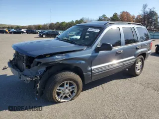 2004 Jeep Grand Cherokee Laredo z VIN 1J4GW48S74C159381, wystawiony jako Copart lot #53972115 z przebiegiem 128 309 mil mil oraz Szkody całkowita. Historia ofert i sprzedaży dostępna na DreamBid. Obrazek 1.