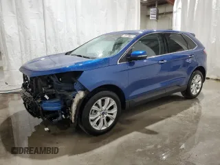 2022 Ford Edge Titanium z VIN 2FMPK4K92NBA54168, wystawiony jako Copart lot #59367795 z przebiegiem 87 704 mil mil oraz Czysty tytuł • Clean title. Historia ofert i sprzedaży dostępna na DreamBid. Obrazek 1.