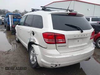 2016 Dodge Journey SE with VIN 3C4PDCAB6GT250263, listed as a IAAI auction lot 41436271 with 162,879 mi miles and . Bid and sale history available at DreamBid. Image 3.