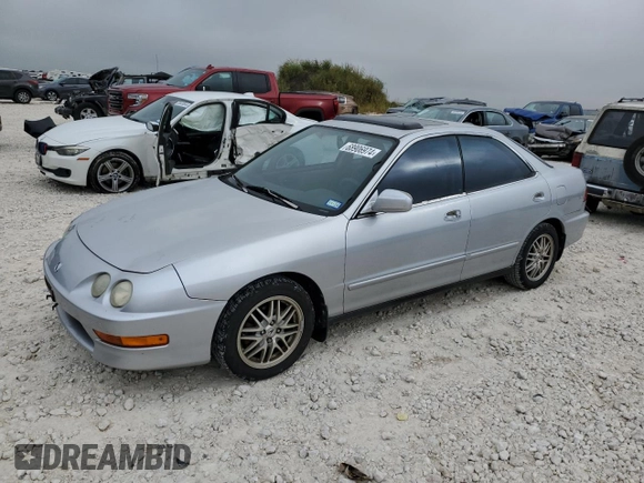 2001 Acura Integra LS z VIN JH4DB76571S000122, wystawiony jako Copart lot #68906974 z przebiegiem 162 045 mil mil oraz Czysty tytuł • Clean title. Historia ofert i sprzedaży dostępna na DreamBid. Obrazek 1.