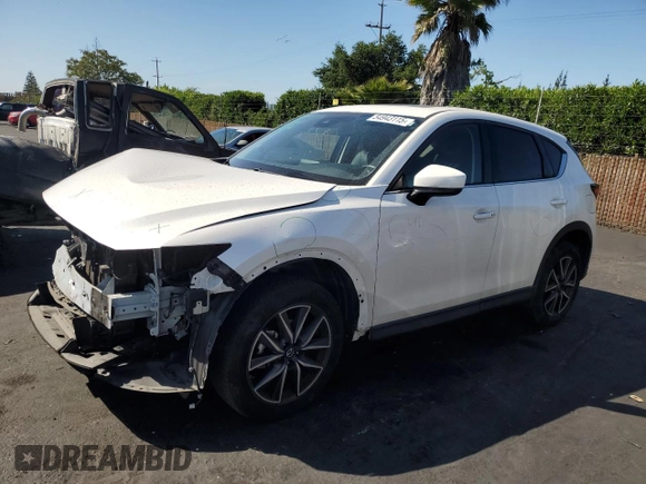 2017 Mazda CX-5 Grand Touring with VIN JM3KFBDL7H0202831, listed as a Copart auction lot 54943115 with 69,933 mi miles and Salvage Title. Bid and sale history available at carsss.com. Image 1.