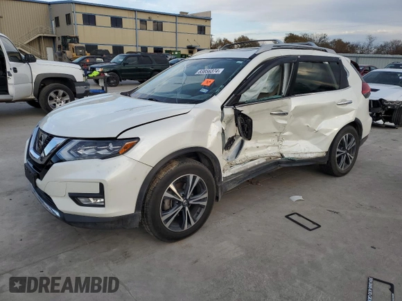 2017 Nissan Rogue SL with VIN 5N1AT2MT0HC825974, listed as a Copart auction lot 83856374 with Not provided miles and Salvage title. Bid and sale history available at DreamBid. Image 1.