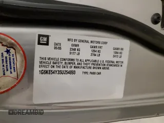 2005 Cadillac DeVille DHS z VIN 1G6KE54Y35U254893, wystawiony jako Copart lot #60356815 z przebiegiem 177 174 mil mil oraz Czysty tytuł • Clean title. Historia ofert i sprzedaży dostępna na DreamBid. Obrazek 12.