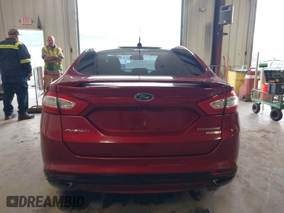2016 Ford Fusion Titanium z VIN 3FA6P0K95GR119017, wystawiony jako IAAI lot #42148460 z przebiegiem 84 770 mil mil oraz . Historia ofert i sprzedaży dostępna na DreamBid. Obrazek 16.