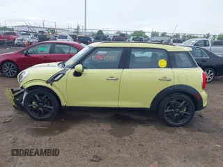 2012 MINI Countryman S z VIN WMWZC3C59CWL82955, wystawiony jako IAAI lot #42237702 z przebiegiem 61 903 mil mil oraz . Historia ofert i sprzedaży dostępna na DreamBid. Obrazek 15.