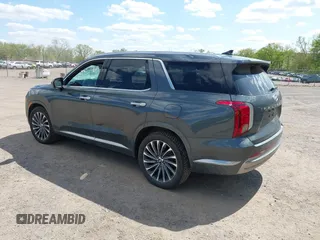 2023 Hyundai Palisade Calligraphy z VIN KM8R7DGE5PU499257, wystawiony jako IAAI lot #42231889 z przebiegiem 90 714 mil mil oraz . Historia ofert i sprzedaży dostępna na DreamBid. Obrazek 3.