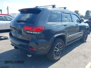 2018 Jeep Grand Cherokee Trailhawk with VIN 1C4RJFLT0JC316172, listed as a IAAI auction lot 42174162 with 81,891 mi miles and . Bid and sale history available at DreamBid. Image 4.
