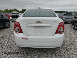 2015 Chevrolet Sonic LS with VIN 1G1JA5SH4F4165108, listed as a Copart auction lot 57299985 with 117,669 mi miles and Clean title. Bid and sale history available at DreamBid. Image 6.