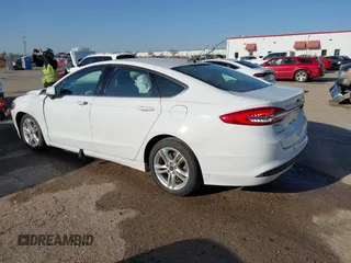 2018 Ford Fusion Hybrid SE with VIN 3FA6P0LU7JR188124, listed as a IAAI auction lot 41760184 with 74,731 mi miles. Bid and sale history available at carsss.com. Image 3.