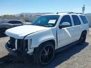 2012 Chevrolet Tahoe LS with VIN 1GNSCAE06CR141256, listed as a IAAI auction lot 41806708 with 105,984 mi miles and . Bid and sale history available at DreamBid. Image 2.