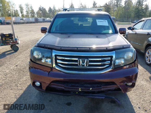 2014 Honda Pilot Touring with VIN 5FNYF4H93EB502117, listed as a IAAI auction lot 42086774 with 111,003 mi miles and . Bid and sale history available at carsss.com. Image 13.