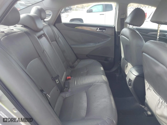 2013 Hyundai Sonata Hybrid with VIN KMHEC4A42DA089524, listed as a IAAI auction lot 41233221 with 114,636 mi miles. Bid and sale history available at carsss.com. Image 8.