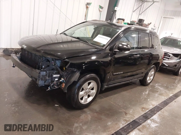 2014 Jeep Compass Sport with VIN 1C4NJCBA3ED777881, listed as a IAAI auction lot 41845518 with 113,566 mi miles. Bid and sale history available at carsss.com. Image 2.