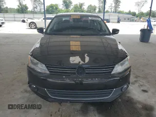 2012 Volkswagen Jetta SEL with VIN 3VWLX7AJ2CM409477, listed as a Copart auction lot 59476915 with 156,035 mi miles and Salvage title. Bid and sale history available at DreamBid. Image 5.