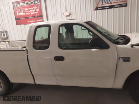 2001 Ford F-150 XL with VIN 1FTPX17L31NB27121, listed as a IAAI auction lot 41169060 with 247,389 mi miles and . Bid and sale history available at DreamBid. Image 13.