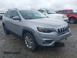 2019 Jeep Cherokee Latitude Plus with VIN 1C4PJMLX7KD104542, listed as a IAAI auction lot 41972055 with 105,129 mi miles. Bid and sale history available at carsss.com. Image 1.